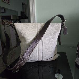 Coach Pebbled Leather Crossbody Shoulder Bag Beige With Brown Accents.